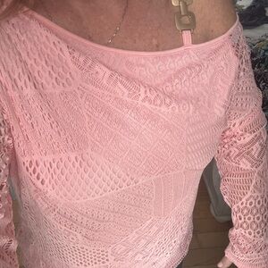 Brand new lace top with original tags with buckle on one side. Very feminine.